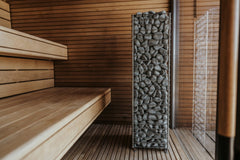 HUUM CLIFF heater in modern sauna interior